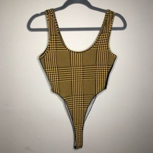 Yellow & Black High Rise Body Suit